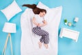 Full body high angle top above flat lay view profile photo of hurted lady lying pillow blanket bedroom eyes closed hold