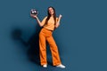 Full body length photo of party girl receive gift at party holding shiny disco ball raised fist up isolated on dark blue Royalty Free Stock Photo