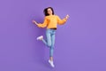 Full body length photo of young attractive nice girl dancing celebrating trampoline jump hands up good mood isolated on Royalty Free Stock Photo