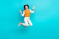 Full body length photo of young overjoyed promoter businesswoman jump trampoline high five palms extra salary isolated Royalty Free Stock Photo