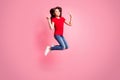 Full body photo of cheerful kid girl jump make v-sign wear red casual style outfit isolated over pastel color background Royalty Free Stock Photo