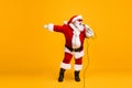 Full body photo of crazy santa claus sing microphone song on christmas x-mas newyear disco wear sunglass headwear cap Royalty Free Stock Photo