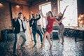 Full body photo of friends meeting rejoicing dance floor x-mas party festive cool mood glitter air wear luxury Royalty Free Stock Photo