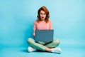 Full body photo of frustrated girl sit crossed work computer read social media information impressed scream unbelievable