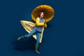 Full body photo of funky carefree girl bring umbrella running wear yellow rain jacket goretex walk puddle isolated on