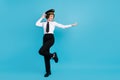 Full body photo of funny funky happy young woman dance dream mood pilot isolated on blue color background