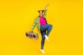 Full body photo of happy cheerful afro american woman boombox music lover isolated on yellow color background