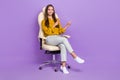Full body photo of manager sit index promo wear blouse trousers sneakers on purple color background