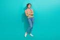 Full body photo of minded stunning lady folded hands look empty space fantasize isolated on teal color background