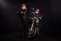 Full body photo of old bikers man lady couple drive chopper travel feel young rock moto festival arms crossed wear Royalty Free Stock Photo