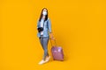 Full body photo of pretty young lady photographer hold rolling bag camera travel airport quarantine walk check-in wear Royalty Free Stock Photo