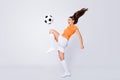 Full body photo of skilled lady soccer team player euro 2020 league game take ball on knee showing trick wear football