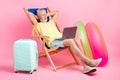 Full body photo of take nap chill pensioner man lying sunbathing chair abroad watch laptop hotel review isolated on pink