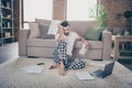 Full body photo of troubled confused marketer collar man sit carpet floor work home laptop cant prepare startup progress Royalty Free Stock Photo