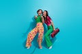 Full body photo of weekend girlfriends sing microphone bring retro old school boombox pointing select you isolated on Royalty Free Stock Photo