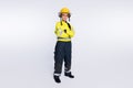 Full body photo of young attractive woman firefighter serious confident folded hands isolated over white color Royalty Free Stock Photo