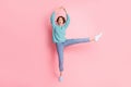 Full body photo of young excited woman raise hands legs ballet isolated on pastel pink color background