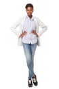 Full body attractive young black woman in blazer standing against white background