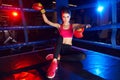 Full body portrait of boxer woman sitting in ring corner Royalty Free Stock Photo