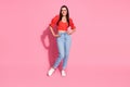 Full body portrait of nice young lady posing empty space wear top isolated on pink color background Royalty Free Stock Photo