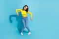 Full body portrait of unsatisfied girl robot motion empty space ad isolated on blue color background