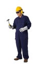 Full body portrait of a worker in Mechanic Jumpsuit is Holding a hammer isolated on white background Royalty Free Stock Photo