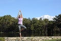 Yogi practicing yoga standing in the mountain