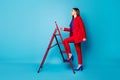 Full body profile photo of attractive professional lady successful worker coming up career ladder wear trend red suit