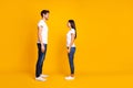Full body profile photo of pair lady and guy looking eyes overjoyed by meeting wear casual outfit isolated yellow color