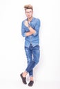 Full body of a serious casual man wearing jeans clothes Royalty Free Stock Photo