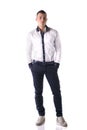 Full body shot of attractive young man white shirt and blue pants Royalty Free Stock Photo