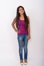 Full body shot of young happy Indian woman smiling while standin Royalty Free Stock Photo