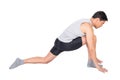 Determined sportsman stretching psoas muscle in studio