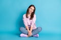 Full body size photo of charming lovely young girl sitting floor crossed legs cheerful resting after forest walk wear