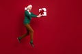 Full body size photo of jumping air gentleman groomed bristle hold desirable magic giftbox receive from santa claus Royalty Free Stock Photo