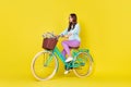Full body size photo of stunning gorgeous student girl riding vintage pretty bike way home carry flowers wear blue