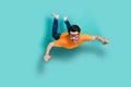 Full body size photo of young funny excited positive guy wear glasses jump air trampoline skydiver freefall isolated on