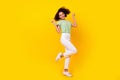 Full body size photo of young pretty attractive nice woman showing v-sign symbol toothy smile dance pose isolated on Royalty Free Stock Photo