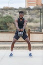 Black sportsman doing kettlebell swing exercise Royalty Free Stock Photo