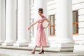 Full body young beautiful brunette in pink dress Royalty Free Stock Photo