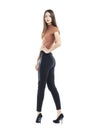 Full body, Young beautiful brunette woman in black pants Royalty Free Stock Photo