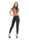 Full body, Young beautiful brunette woman in black pants Royalty Free Stock Photo