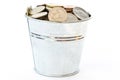 A full bucket of coins Royalty Free Stock Photo