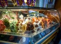 A full, colorful gelato case at a gelateria in Florence, Italy