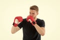 Full concentration. Sportsman concentrated training boxing gloves. Athlete concentrated face with sport gloves practice