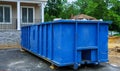 Full construction waste debris a building container, garbage bricks and material from demolished house