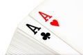 Full deck of playing cards with aces of clubs and hearts on top Royalty Free Stock Photo