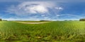 Full 360 degree seamless panorama in equirectangular spherical equidistant projection. Panorama in a field near a road with Royalty Free Stock Photo