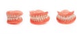 Full denture close-up. Dentures. Full removable plastic denture of the jaws. Jaw in all angles