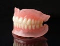 Full denture dentures on black Royalty Free Stock Photo